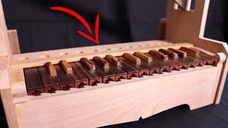 I build the wooden keyboard of the new portative pipe organ