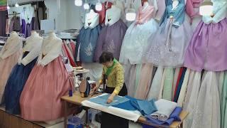 Process of Weaving Silk and Making Traditional Clothing in Korea. Hanbok Manufacturing Process