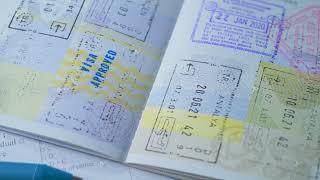 Tourist visa stamp in passport, approved decision