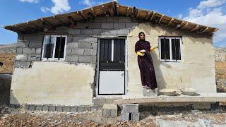 A widowed mother builds a home for her children in the rugged mountains