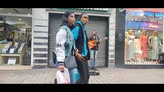 Telented Street musician playing guitar in the streets of downtown Tunis close to Rue de Marseille