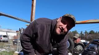 New Hampshire Fish and Game Department Wildlife Biologist Patrick Tate Does a deer biological check