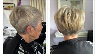 Learn how to cut a short graduated hair cut with scissor over comb NVQ level 2 and 3