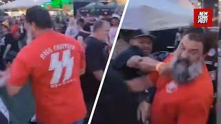 ‘No f**king Nazis!’: Punk-rockers rough up fan wearing SS shirt