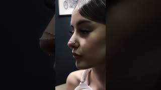 High nostril piercings, and a double nose chain with Base Laboratories Piercing Aftercare Spray