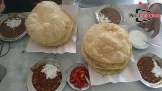 Traditional brunch Halwa poori tasty food  by road reporters