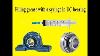 Filling grease with a syringe in UC bearing