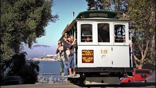 Standing in the open carriage | Cable cars in San Francisco