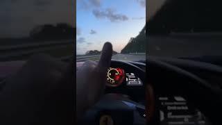 Thumbs up by Ferrari racing on german highway going 326 kmh (205mph)!!!