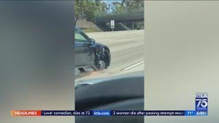 Wild video shows woman driving on Orange County freeway with 3 wheels, sparks flying