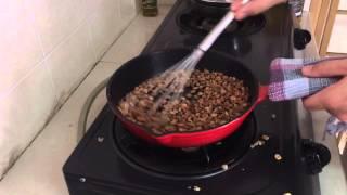 Roasting coffee with cast iron skillet and a whisk