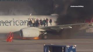 American Airlines plane headed to Dallas catches fire at Denver airport