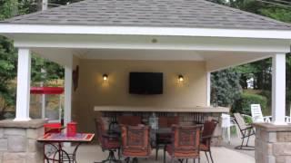 Explore This Poolside Bar with Carriage Lights | Homestead Structures Avalon Pool House