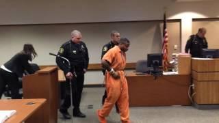 Suspect in court on 20 felonies in connection to triple slaying