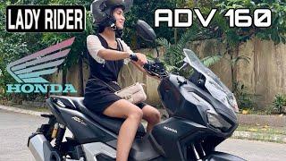 Lady rider on Honda ADV 160