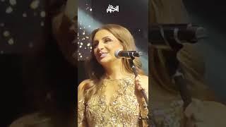 أنغام توقف الغناء بسبب وردة المعجب المسرح