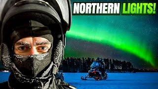 Snowmobiling Under Northern Lights in the Arctic Circle