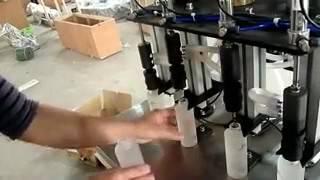 Four heads perfume liquid filling machine