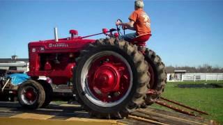 Unloading a super nice 1947 "M"  Farmall