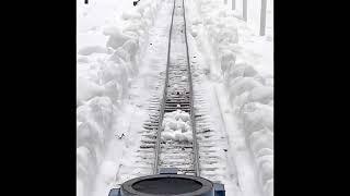 Time lapse of freshly plowed tracks at Waushakum Live Steamers Holliston MA USA days after blizzard.