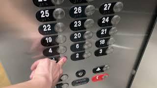 Newer Otis Series 4 Traction High-Rise Elevators at Marriott Marquis in Downtown Houston, TX.