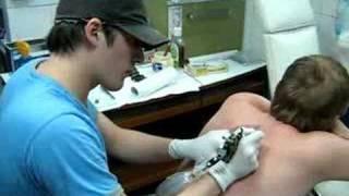 At Work tattooing