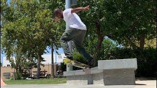 Taking a break from work to enjoy a nice day with some skateboarding.