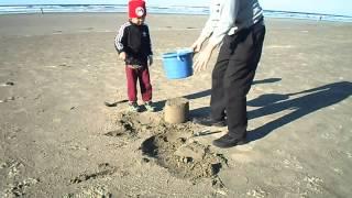 Build the sand castle with Daddy on Nye Beach