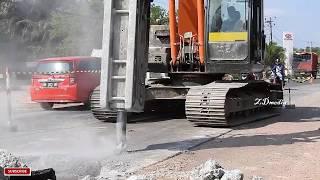 Excavator Working for New Road Contructions Cutting Breaking Concrete Road by Hitachi Zaxis 210f