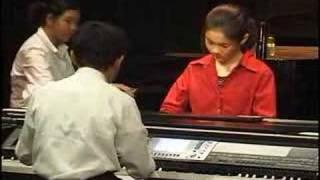 Joplin: The Entertainer by the Tchii's 10-Piano Ensemble