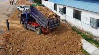 Small Bulldozer Working Pushing Dirt And Rock - Mini Dump Truck Unloading Gravel And Dirt