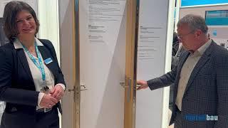 Mit Metallbaumeister Ralf Schödel am BAU-Messestand von Assa Abloy