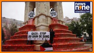 Paris Protest: Pro-Palestinian Activists Dye Fountain Red, Demand Macron Act on Gaza | News9