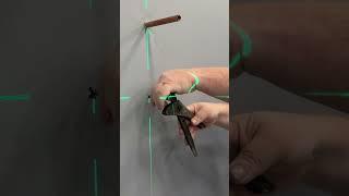 Old school drill Plumber shows how to drill a wall for a clip #asmr  #diy  #diyplumbing #diyplumber