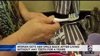 Woman gets her smile back after living without any teeth for  years