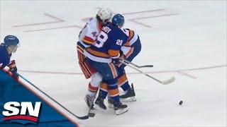 Islanders' Alexander Romanov CRUSHES Devils' Miles Wood With Massive Open-Ice Hit