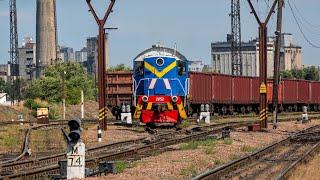 The shunting diesel locomotive TEM2-2052 is busy sorting freight cars at the railway station.