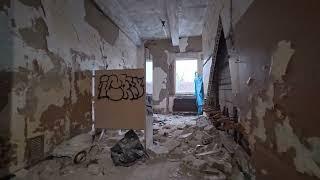 Exploring a creepy abandoned school full of amazing architecture and relics decaying away with time.