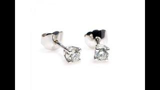 Gold or platinum stud earrings with diamonds