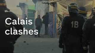 Calais migrants: police clash with refugees at camp