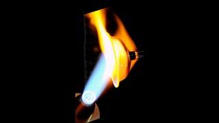 Watch as skilled flameworkers melt glass rods and tubes in a 4,000°F flame #Shorts