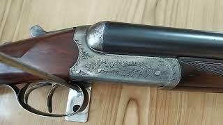 Westley Richard 12 bore double barrel side by side shot gun. Made in England.