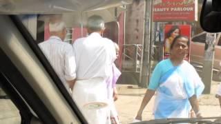 Kerala, India - Men holding hands