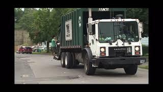 Trash Master Mack MR Leach 2RIII Rear Loader Garbage Truck Picking Up Cardboard