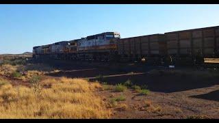 Train of Western Australia...Pilbara Iron Match Up leads 7054 with Empties from Dampier to Tom Price