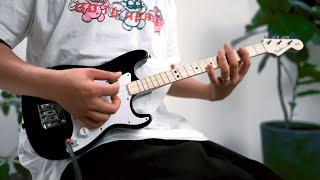 Playing the Smallest Electric Guitar in the World