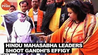 Hindu Mahasabha leaders shoot Gandhi's effigy, garland Godse's statue