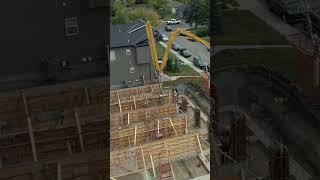 Omega 2000 Cribbing Inc pouring a multifamily foundation in Calgary.