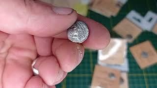 Unboxing replica Celtic coins.