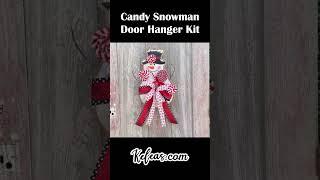  Sweeten Up Your Holiday Decor with the Candy Snowman Door Hanger! 